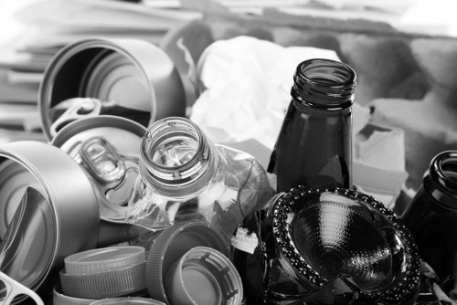 Safety supervisor reviewing risk assessment documents on site